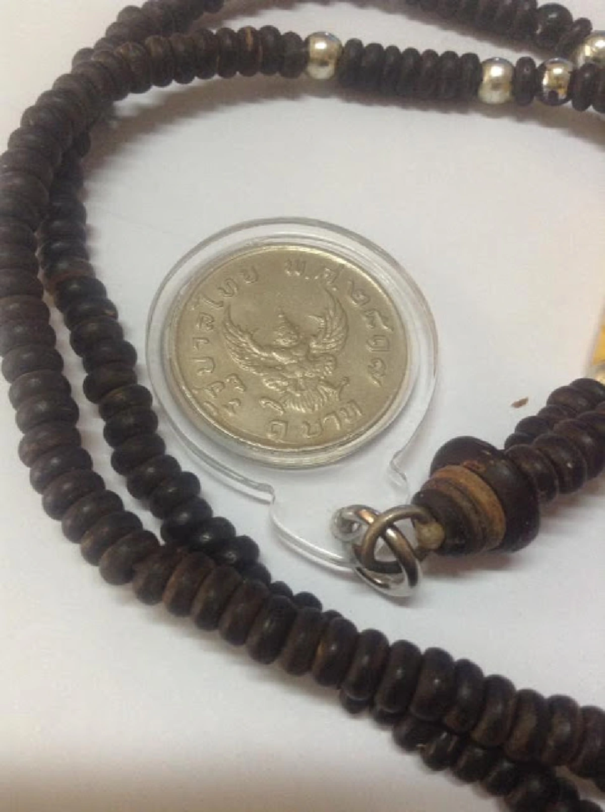 อาถรรพ์ชวนสะพรึง!! เรื่องเล่าจากพรานป่า ของเหรียญบาทตราครุฑ ปี ๒๕๑๗ และเหตุผลว่าทำไมจึงไม่นิยมแขวนพระเข้าป่า!!