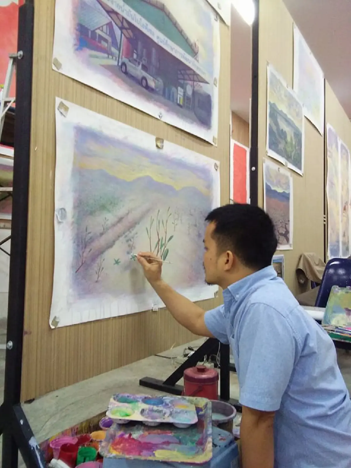 ถ่ายทอดจากความจงรักภักดี!! ศาสตร์ของพระราชา.."จิตรกรรมฉากบังเพลิง " จรดภาพวาดจาก "องค์พระนารายณ์อวตาร" สู่ "โครงการพระราชดำริของในหลวง ร.๙"